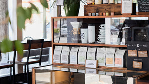 Image of bagged coffee and merch at cafe